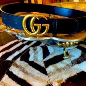 Black Double G belt marked Gucci.